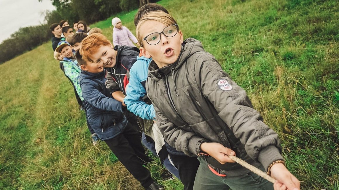 These children play the ancient game of tug-of-war. The photo was taken on the day during the festival of children’s creativity. Young actors from different cities of Bashkortostan Republic shared their experience, performed dances and songs.